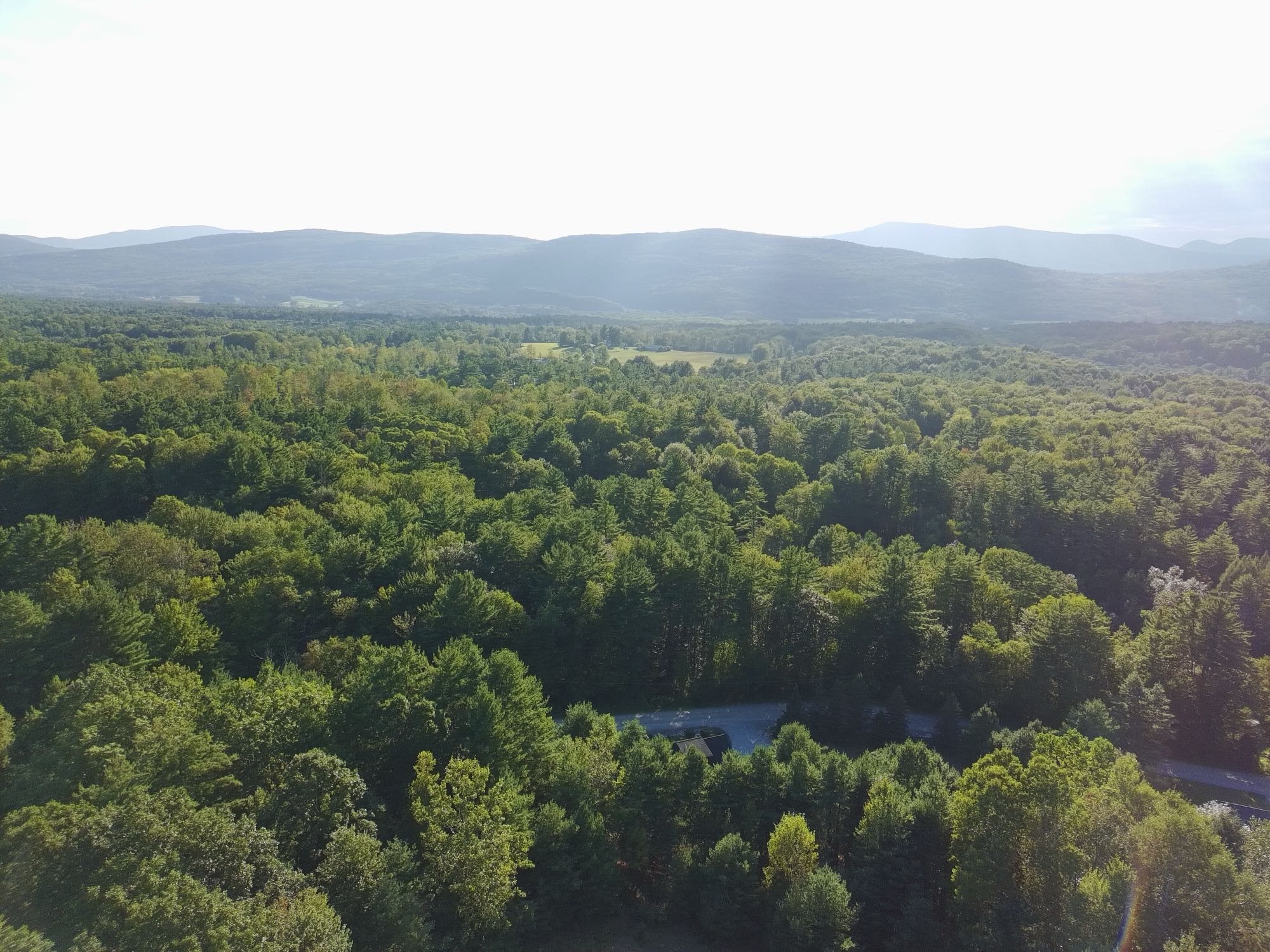 Aerial view of a Vermont property, the landscape Leviosa shoots from above